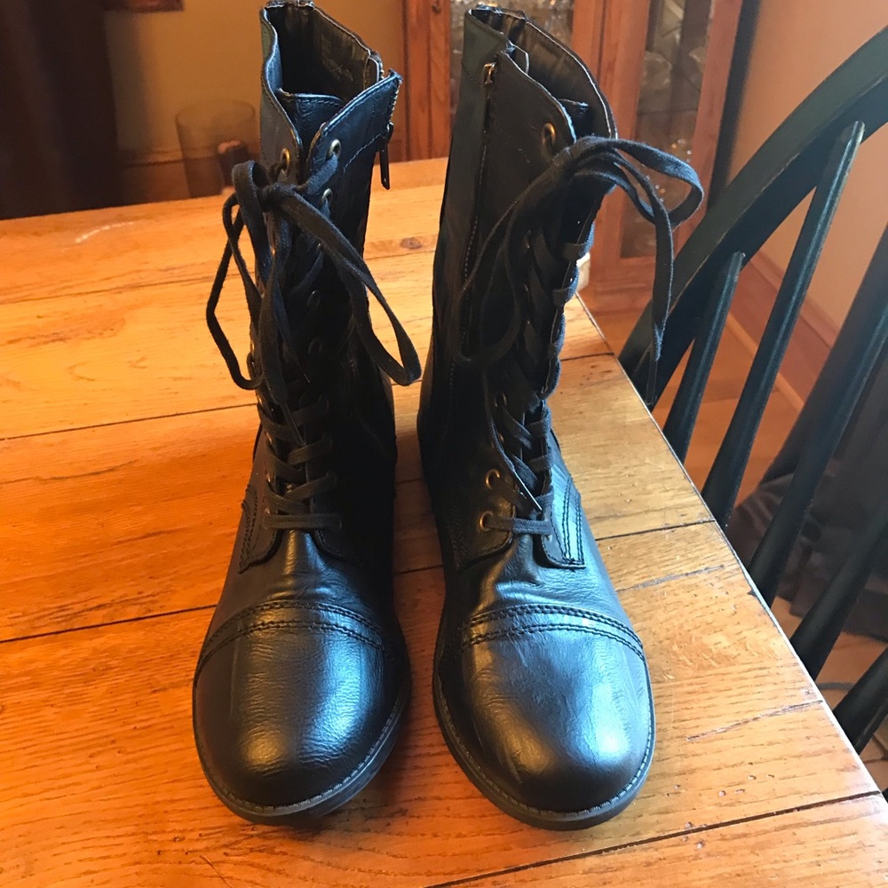 Like new, worn once.  Super cute black boots.